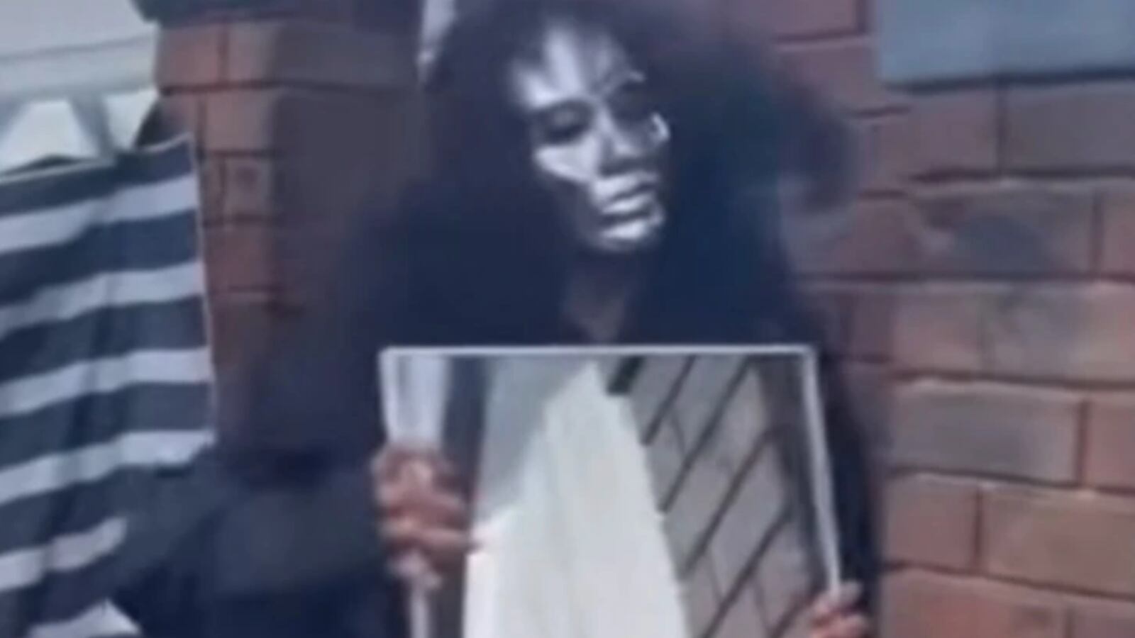 A masked character known as “The Unknown” pops out from behind a mirror.