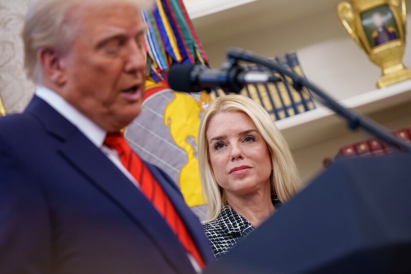 President Donald Trump, accompanied by Pam Bondi (C), speaks before Bondi is sworn in as U.S. Attorney General in the Oval Office at the White House on February 05, 2025 in Washington, DC.