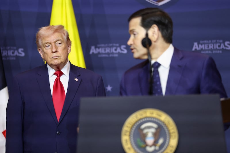 U.S. Secretary of State Marco Rubio speaks next to U.S. President Donald Trump during the "Shield of the Americas" Summit in Miami, Florida, U.S., March 7, 2026. REUTERS/Kevin Lamarque