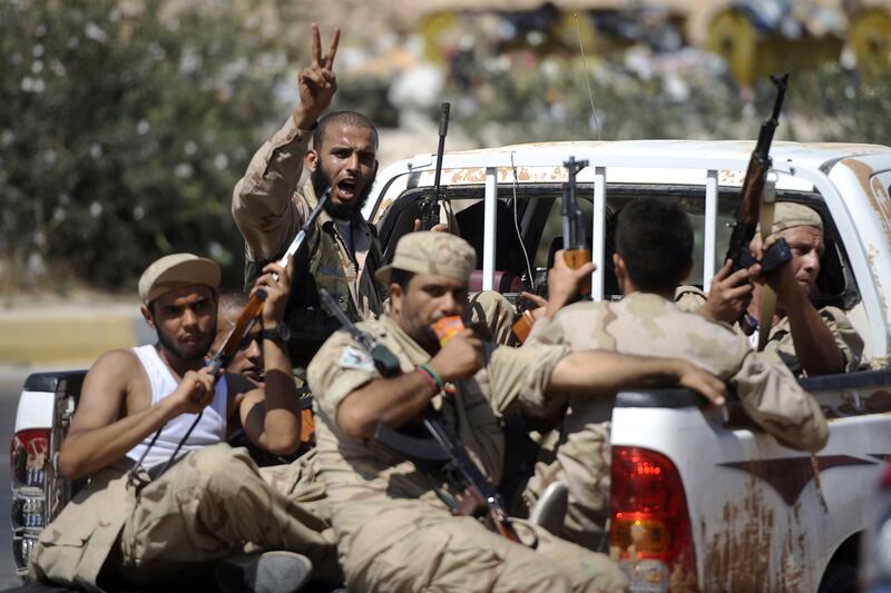 galleries/2011/08/21/libya-rebels-take-tripoli-capture-gaddafi-sons-photos/libya-rebels1_k6fs9j