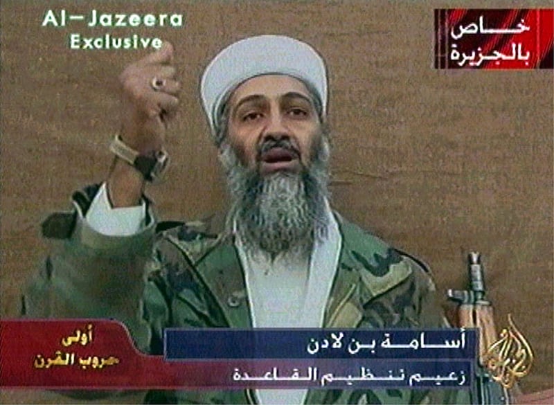 Osama Bin Laden is seen gesturing during a videotaped statement broadcast November 3, 2001, in this still taken from the footage.