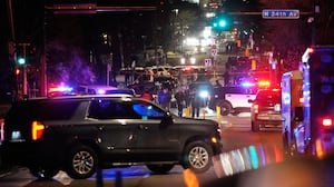Law enforcement at the scene of a reported shooting Wednesday, Jan. 14, 2026, in Minneapolis.