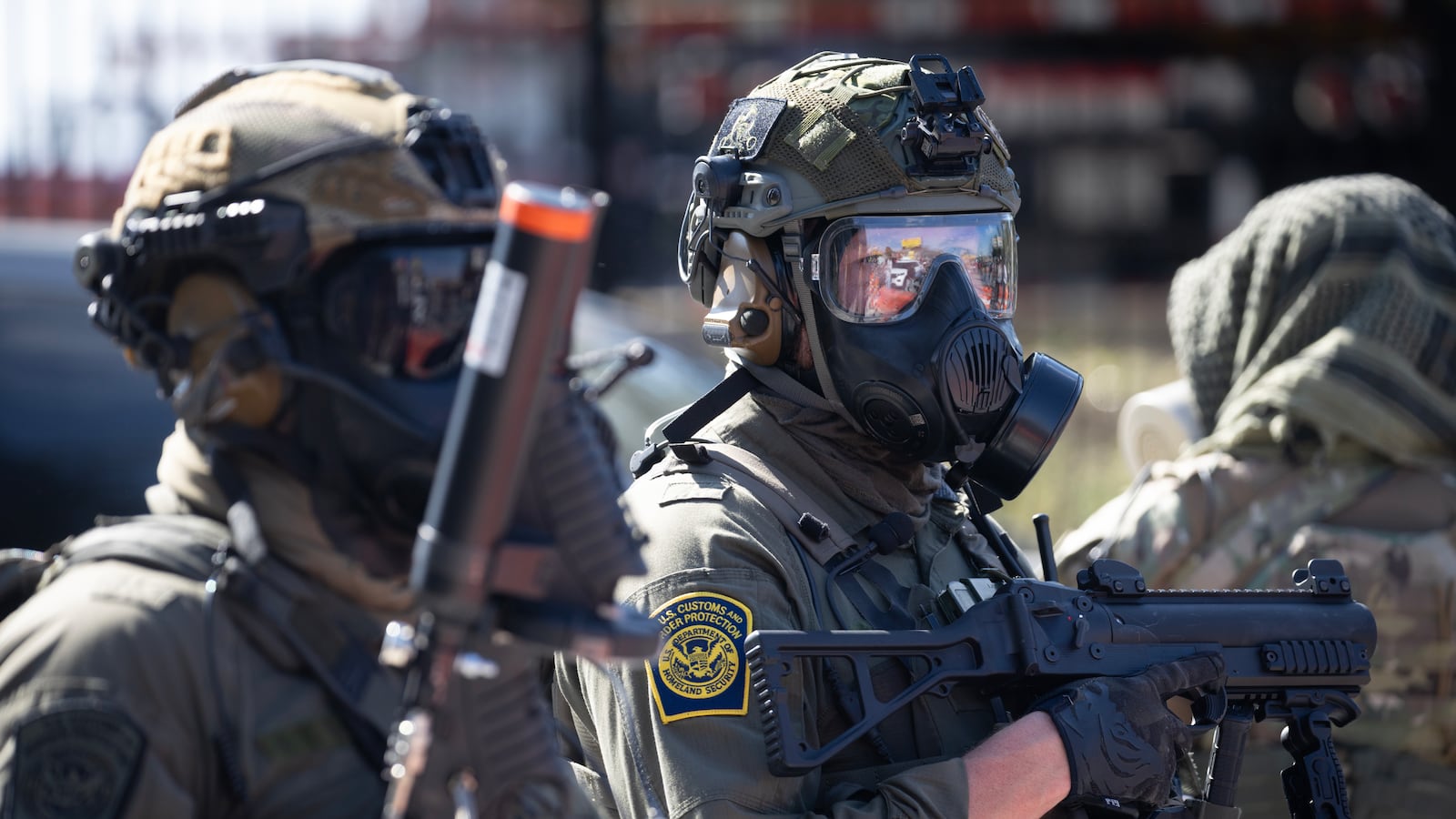 Federal law enforcement agents are confronted by community members and activists for reportedly shooting a woman in the Brighton Park neighborhood on October 04, 2025 in Broadview, Illinois. Residents of the city have become increasingly concerned as Operation Midway Blitz continues in the Chicago area, an operation designed to apprehend and deport undocumented immigrants living in the area.