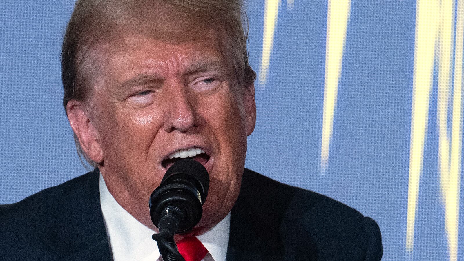 Former US President and Republican presidential candidate Donald Trump addresses the Libertarian National Convention in Washington, DC, May 25, 2024.