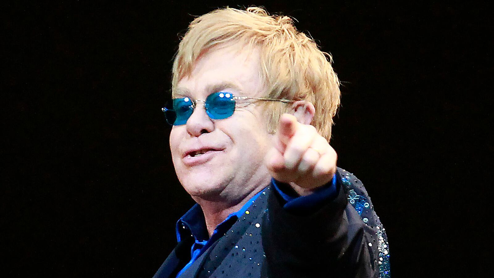 cheats/2012/11/26/elton-sings-for-ai-weiwei/elton-john-china-ai-weiwei-cheat_cgduxt