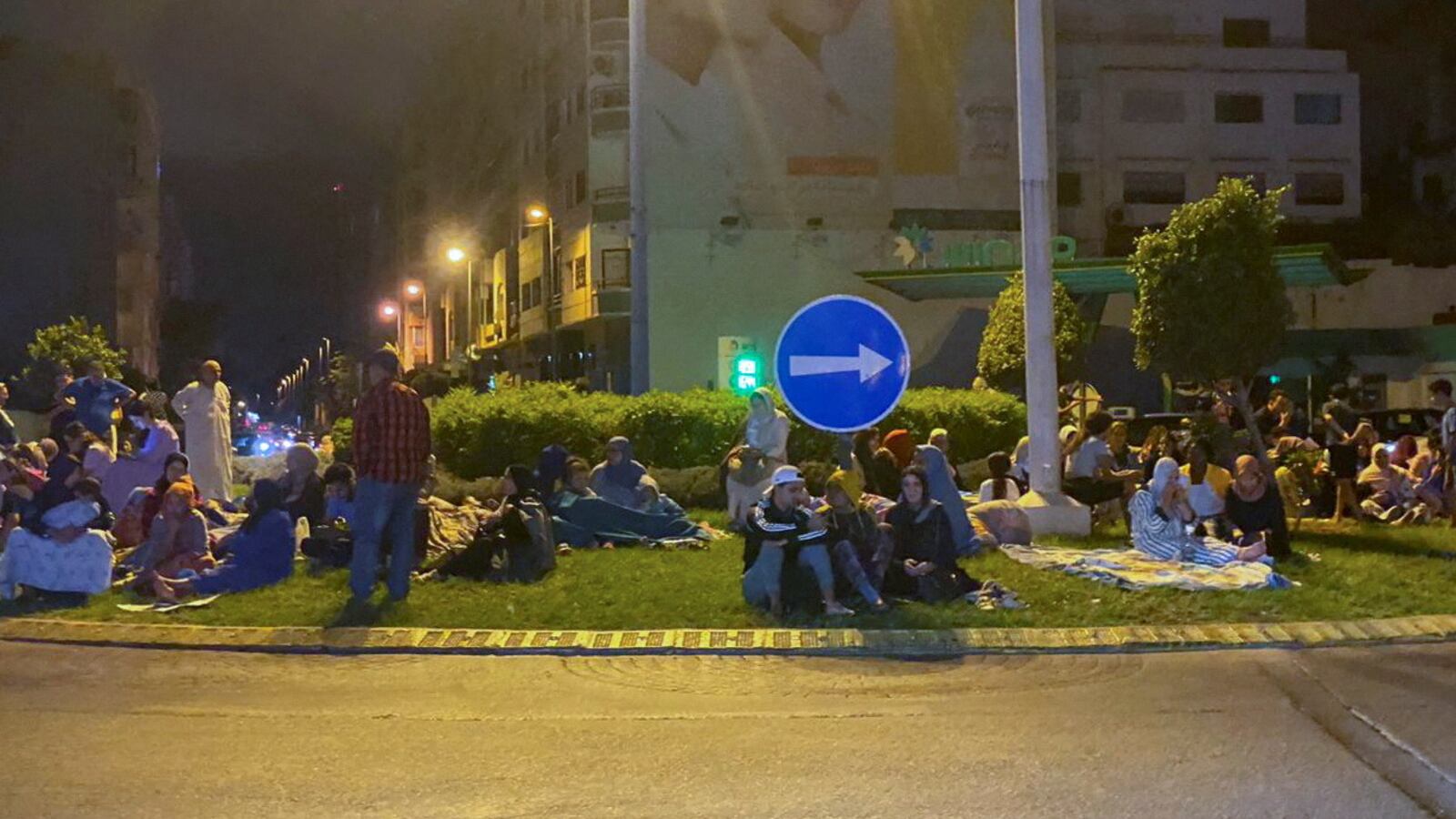 People gather on a street in Casablanca, following a powerful earthquake in Morocco.