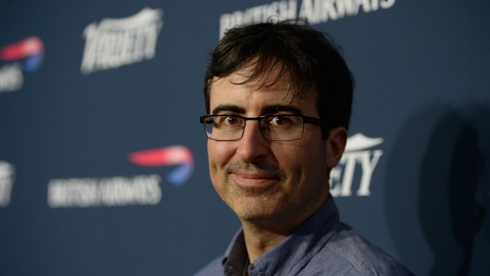 articles/2013/11/15/john-oliver-leaving-daily-show-the-simpsons-heads-to-cable0/john_oliver_leaving_2_duggrw