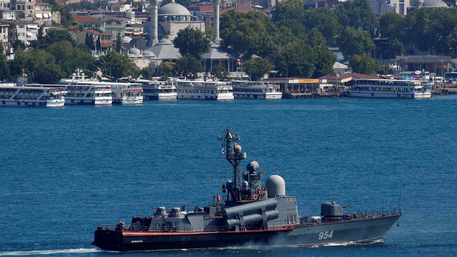 Russian Navy's Tarantul-class corvette Ivanovets is escorted by a Turkish Navy Coast Guard boat.