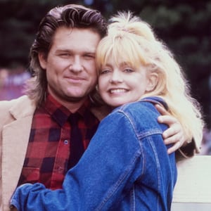 While shooting the movie "Overboard", actors Goldie Hawn and Kurt Russell pose for a portrait in October 1987 in Fort Bragg, California.