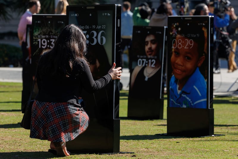 Parents who say their children died from social media-related harms unveil the Lost Screen Memorial, an art installation of illuminated, large-scale smartphones that features 50 children who have lost their lives.