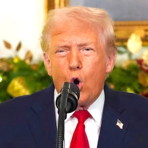 President Donald Trump addresses the nation from the Diplomatic Reception Room of the White House in Washington, DC, on December 17, 2025.