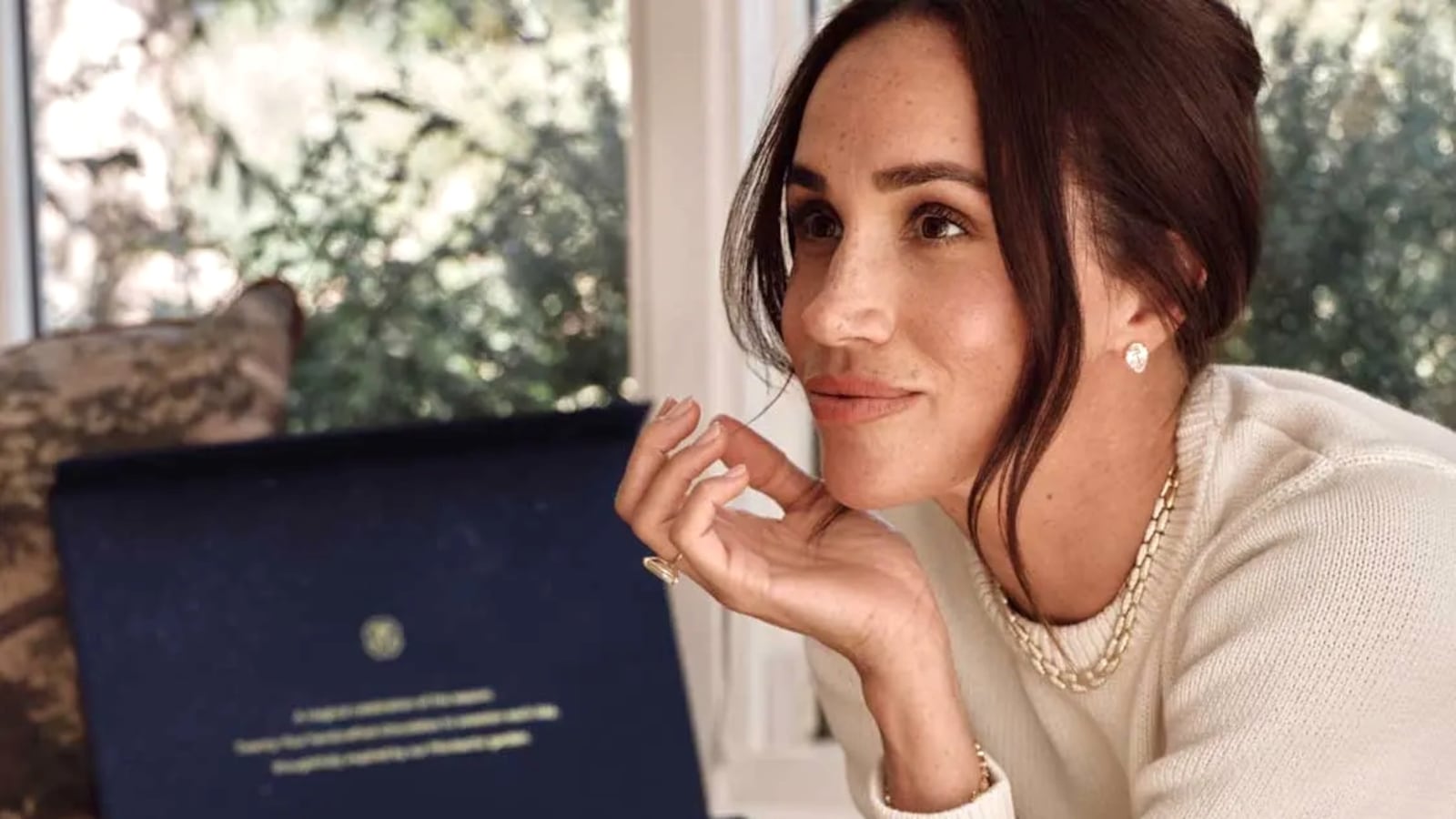Meghan promoting her $148 advent calendar.