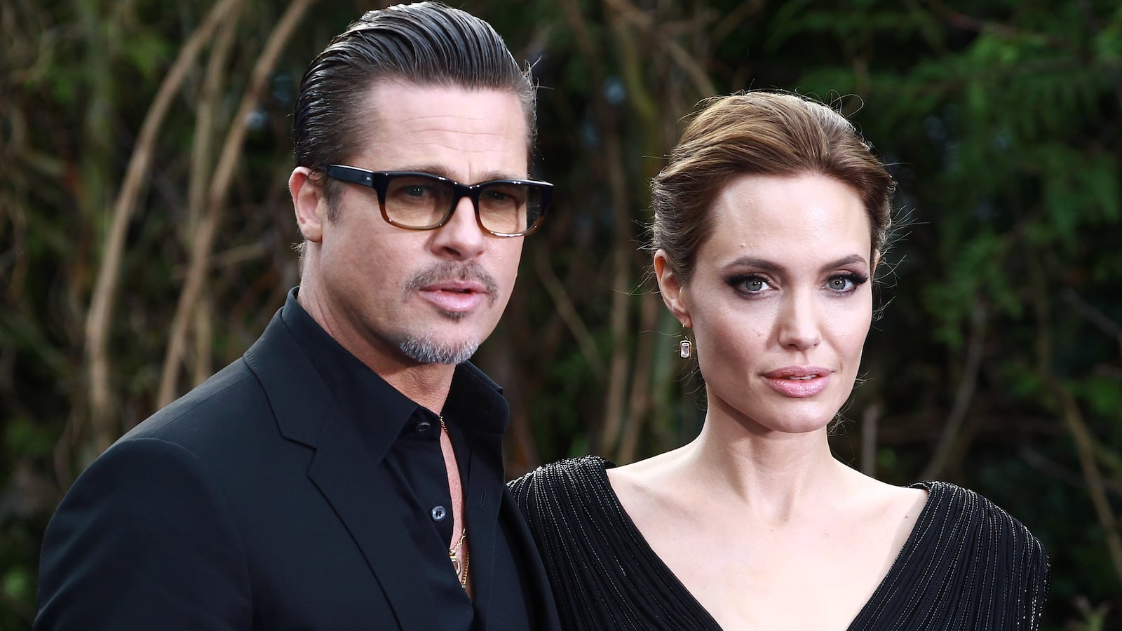 Brad Pitt and Angelina Jolie attend a private reception as costumes and props from Disney's "Maleficent" are exhibited in support of Great Ormond Street Hospital at Kensington Palace on May 8, 2014 in London, England.
