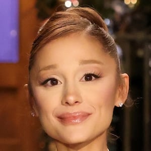 Cher, host Ariana Grande, and Bowen Yang