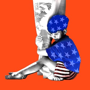 American child holding their parent's legs