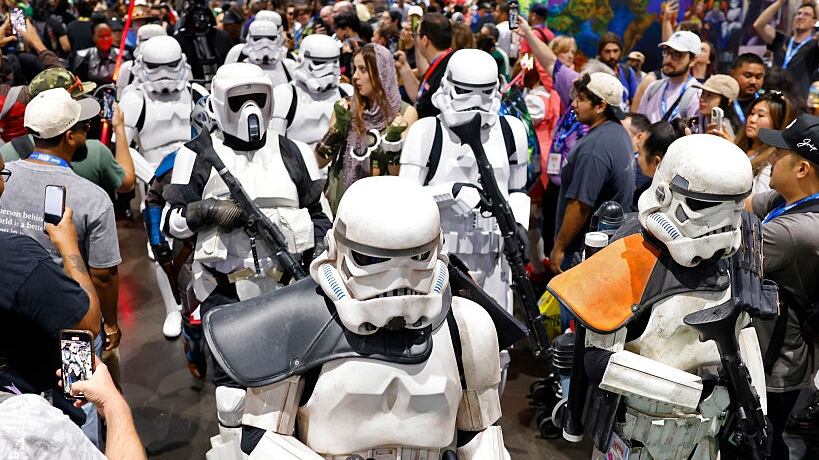 Star Wars Stormtroopers from the 501st Legion walk through Comic-Con International on July 27, 2025 in San Diego, California. The 501st Legion is an international fan-based organization dedicated to Star Wars costuming.