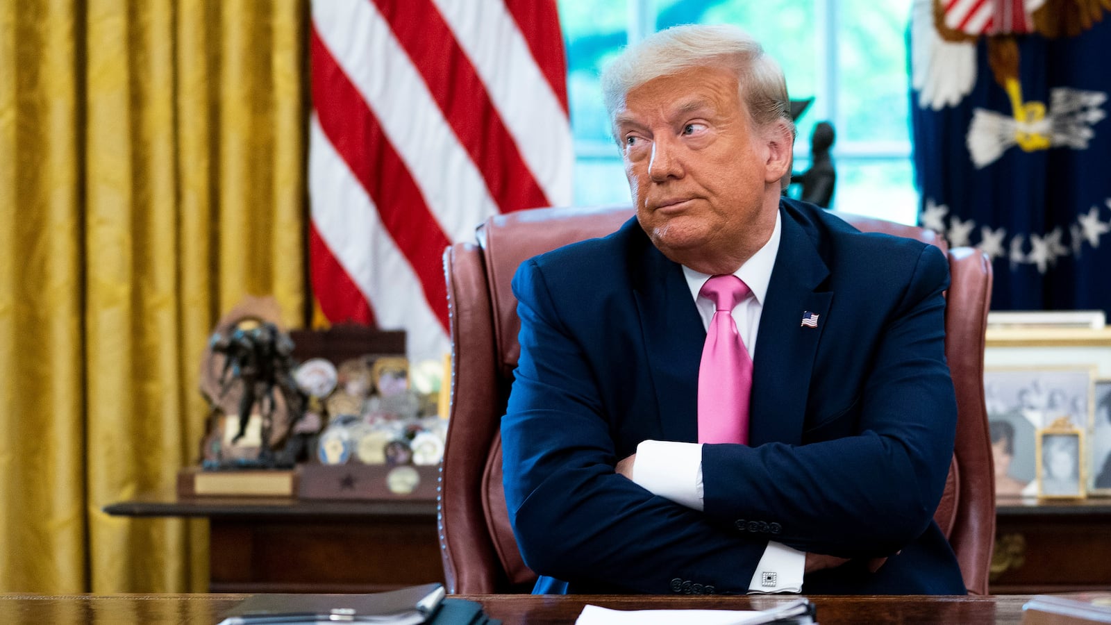 WASHINGTON, DC - JULY 20: U.S. President Donald Trump talks to reporters while hosting Republican Congressional leaders and members of his cabinet in the Oval Office at the White House July 20, 2020 in Washington, DC. Trump and his guests talked about a proposed new round of financial stimulus to help the economy during the ongoing global coronavirus pandemic. (Photo by Doug Mills/Getty Images)