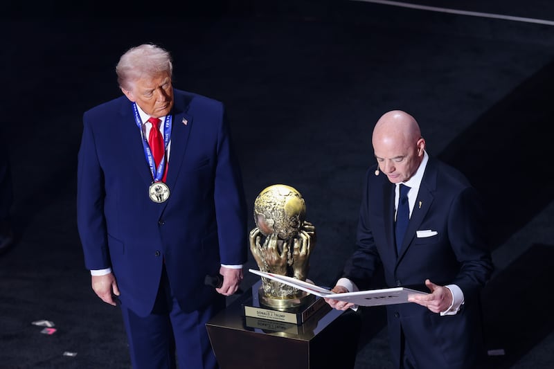 WASHINGTON, DC - DECEMBER 5: FIFA President Gianni Infantino presents the FIFA Peace Price to United States President Donald Trump during the FIFA World Cup 2026 Official Draw at John F. Kennedy Center for the Performing Arts on December 5, 2025 in Washington, DC. (Photo by Roger Wimmer/ISI Photos/ISI Photos via Getty Images)