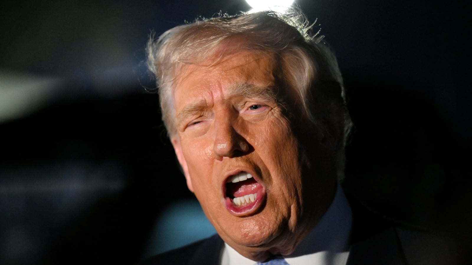U.S. President Donald Trump speaks to reporters before boarding Air Force One on November 16, 2025 at Palm Beach International Airport in West Palm Beach, Florida.