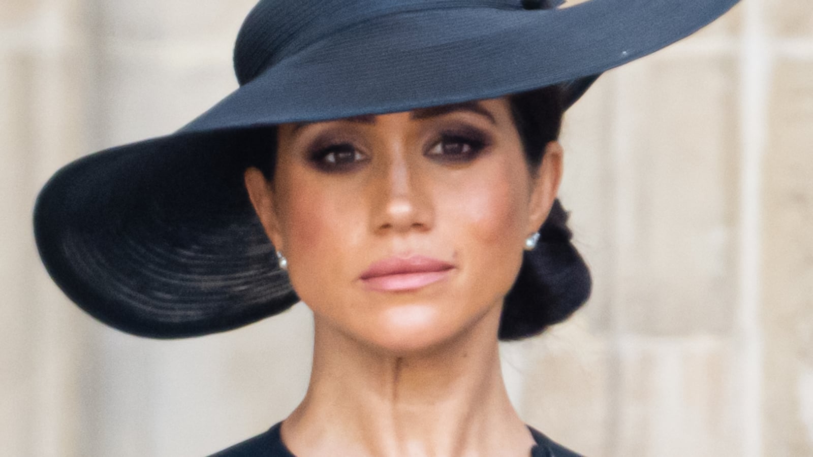 LONDON, ENGLAND - SEPTEMBER 19: (L-R) Meghan, Duchess of Sussexduring the State Funeral of Queen Elizabeth II at Westminster Abbey on September 19, 2022 in London, England. Elizabeth Alexandra Mary Windsor was born in Bruton Street, Mayfair, London on 21 April 1926. She married Prince Philip in 1947 and ascended the throne of the United Kingdom and Commonwealth on 6 February 1952 after the death of her Father, King George VI. Queen Elizabeth II died at Balmoral Castle in Scotland on September 8, 2022, and is succeeded by her eldest son, King Charles III. (Photo by Samir Hussein/WireImage)