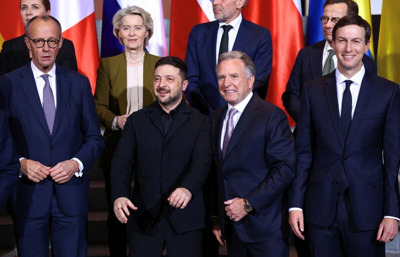 German Chancellor Friedrich Merz, European Commission President Ursula von der Leyen, Zelensky, Witkoff, and Kushner line up for a photo at the Chancellery in Berlin, Germany, last December.