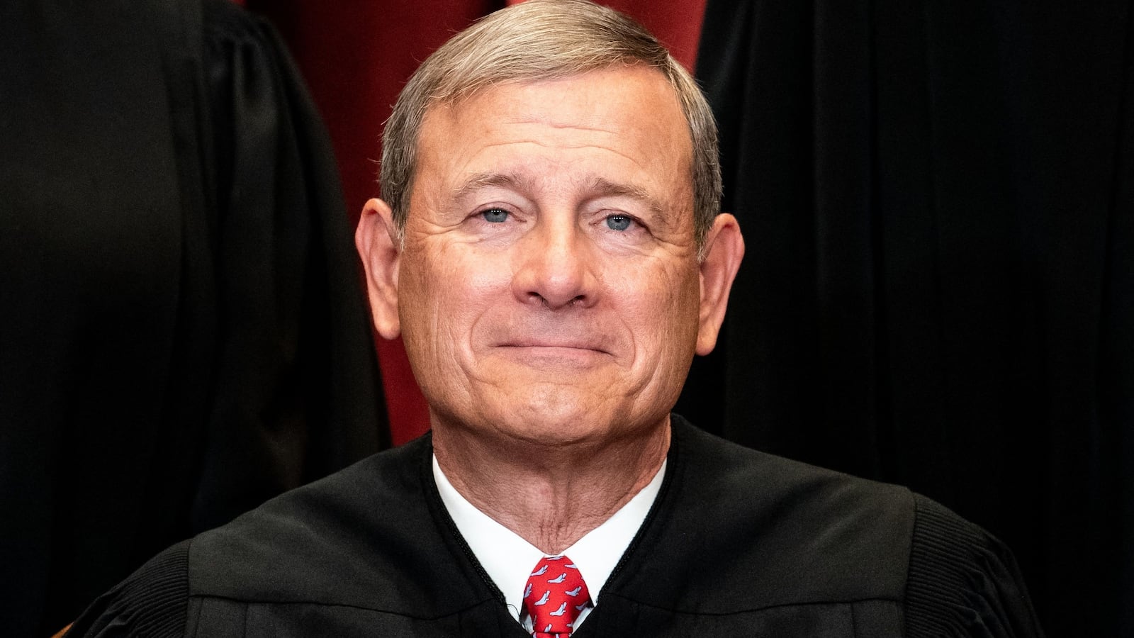 Chief Justice John Roberts sits during a group photo of the Justices at the Supreme Court in Washington, DC on April 23, 2021.