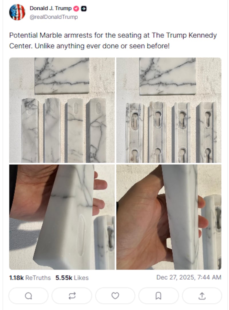 President Donald Trump shows off his new marble armrests for the Kennedy Center.