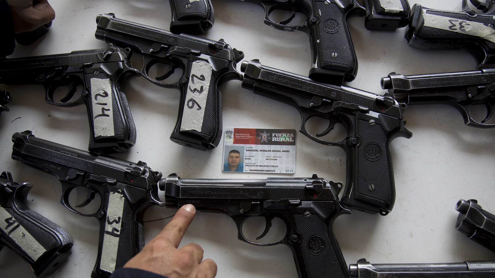 articles/2016/03/26/fighting-mexico-s-new-super-cartel/160325-kryt-cartel-land-tease_bgaler