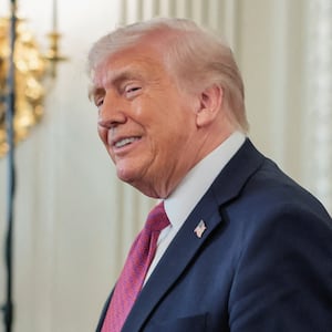 U.S. President Donald Trump attends an event to deliver remarks to NCAA Collegiate National Champions in the State Dining Room at the White House in Washington, D.C., U.S., April 21, 2026.