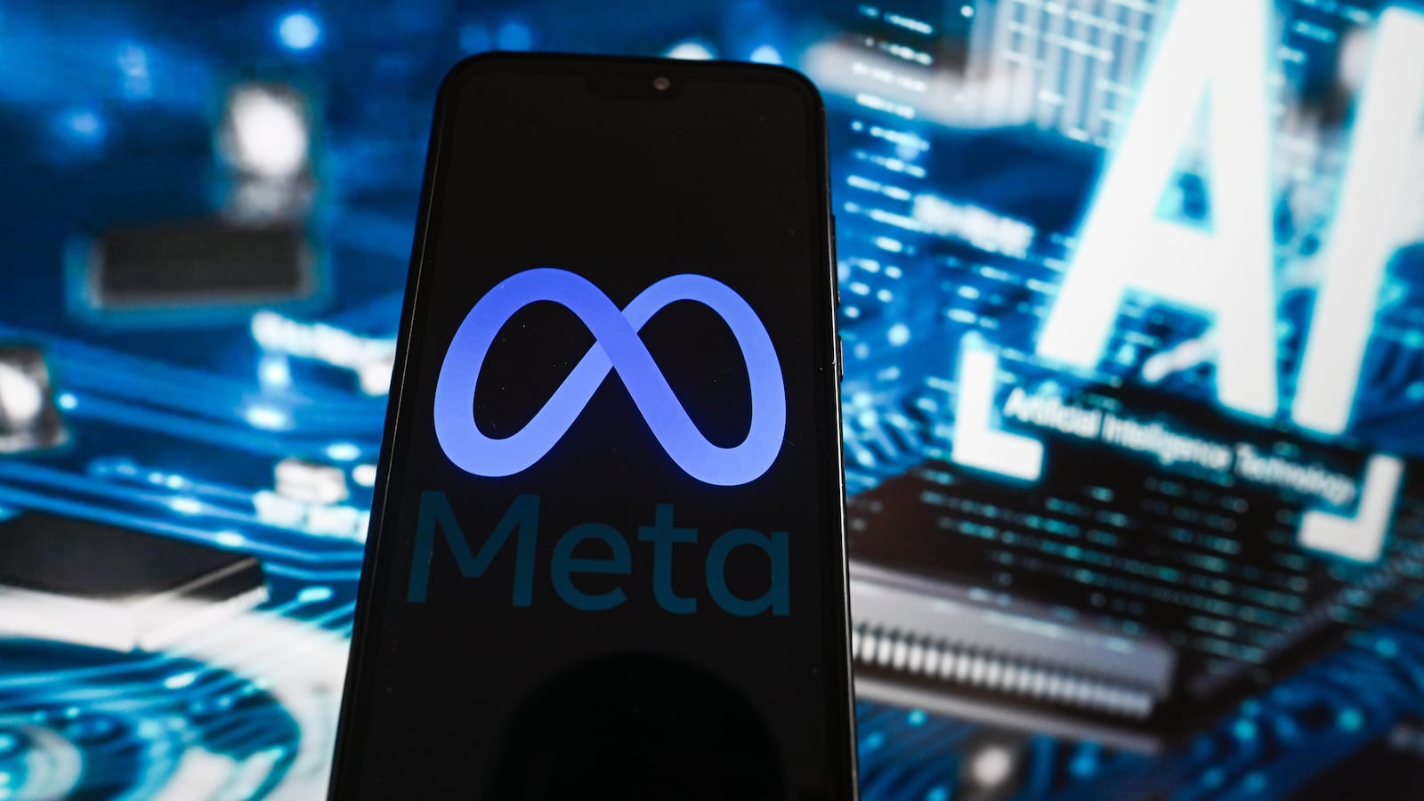 Photo illustration a Meta logo is displayed on a smartphone with artificial intelligence (AI) illustration on the background.