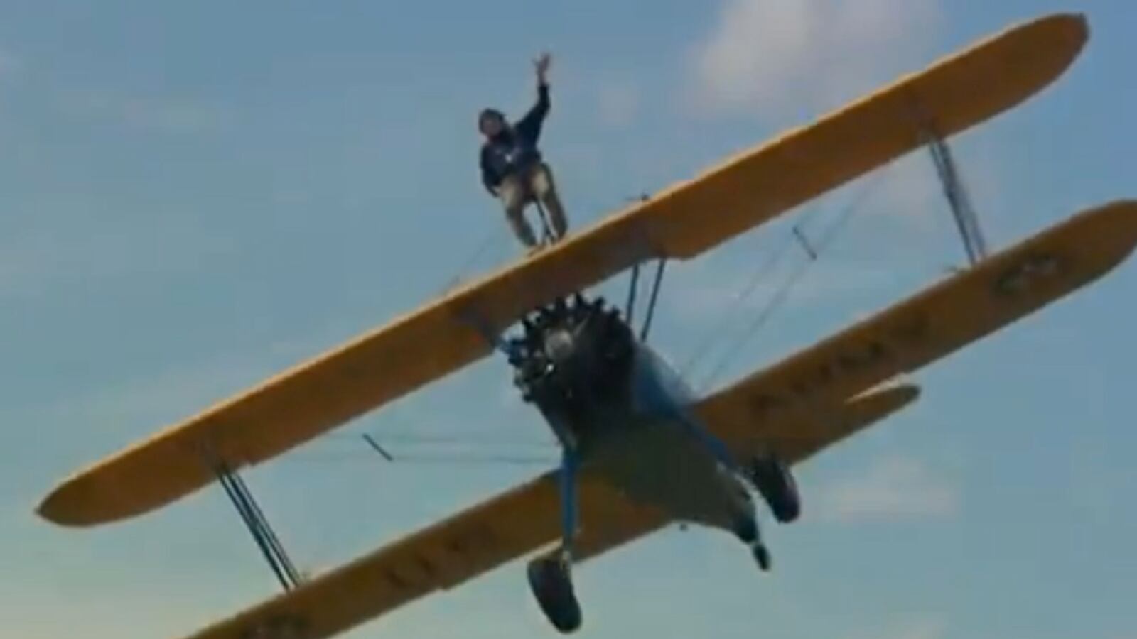 videos/2015/08/04/90-year-old-wwii-vet-takes-a-ride-on-top-of-biplane/150804-viralvid-plane-tease_j83vtl