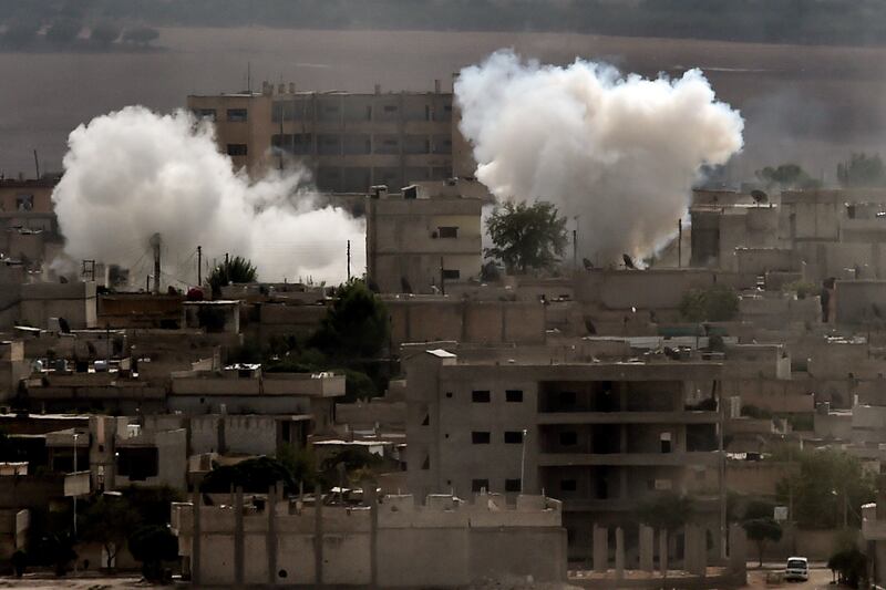 galleries/2014/10/08/unrest-in-kobani/141013-kobani-attack6_jkwiq8