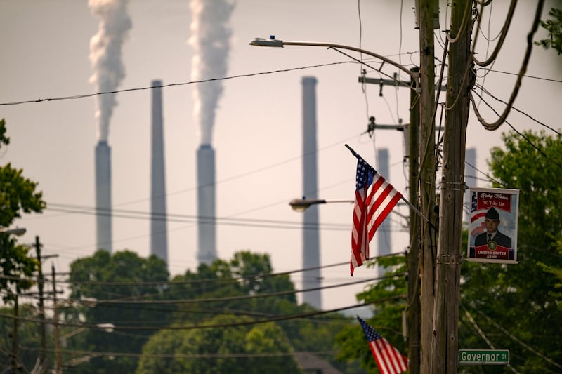 RIPLEY, OHIO - JUNE 12:  Stacks from the Hugh L. Spurlock Generating Station in Maysville, Kentucky are seen on June 12, 2025 from Ripley, Ohio. The station is a 1.3-gigawatt coal power plant owned and operated by the East Kentucky Power Cooperative (EKPC)  The Trump administration announced plans to repeal limits on greenhouse gas emissions and other airborne pollutants from the nation's fossil fuel-fired power plants.  (Photo by Jeff Swensen/Getty Images)