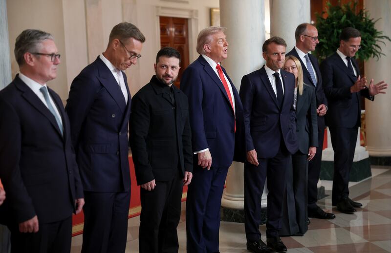President Donald Trump and Ukrainian President Volodymyr Zelensky pose for a picture with European leaders following a meeting in the Oval Office at the White House on August 18, 2025 in Washington, DC.
