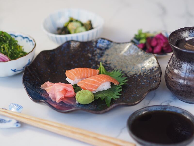 Several preparations of salmon, served at a private tasting event