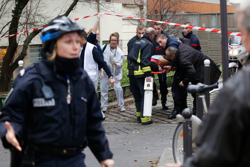 galleries/2015/01/07/gun-attack-on-french-satirical-magazine-photos/150107-Charlie-Hebdo-shooting-01_quwyhu