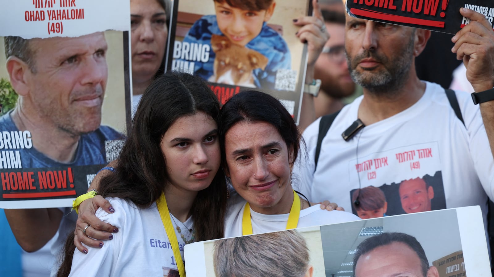 Families and supporters of hostages who are being held in Gaza at a protest.