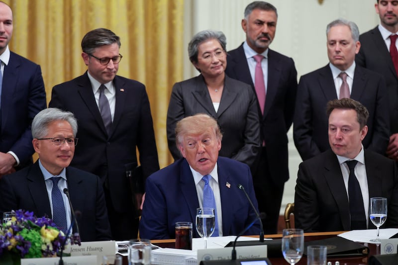 Trump held the A.I. summit in the East Room beside Nvidia CEO Jensen Huang and Elon Musk.
