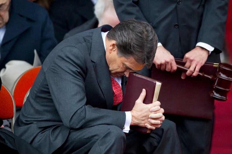 articles/2011/08/05/rick-perry-prayer-rally-undermines-tea-party-s-fiscal-branding/rick-perry-prays-for-rain-boyer_h4c28w
