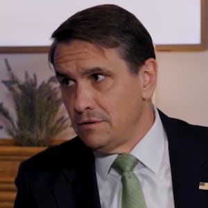 Katie Miller interviewing Todd Blanche on her podcast.