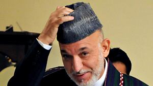 articles/2010/01/18/why-karzai-is-a-survivor/posner-karzai_76134_qtu02p