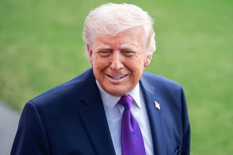 President Donald Trump speaks with reporters on the South Lawn of the White House before boarding Marine One en route to Kentucky on Wednesday, March 11, 2026. (Tom Williams/CQ-Roll Call, Inc via Getty Images)