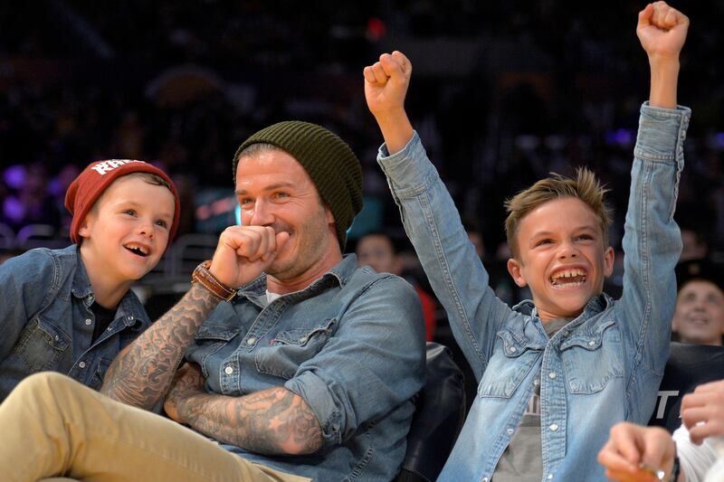 galleries/2013/05/16/let-us-reflect-on-david-beckham-s-hotness/130513-beckham-kids-cheer_ugqoms