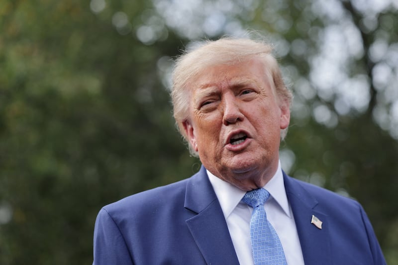 US President Donald Trump speaks to the media at the White House driveway following a luncheon for tech leaders in the East Room, in Washington, D.C., US, September 29, 2026. REUTERS/Jonathan Ernst