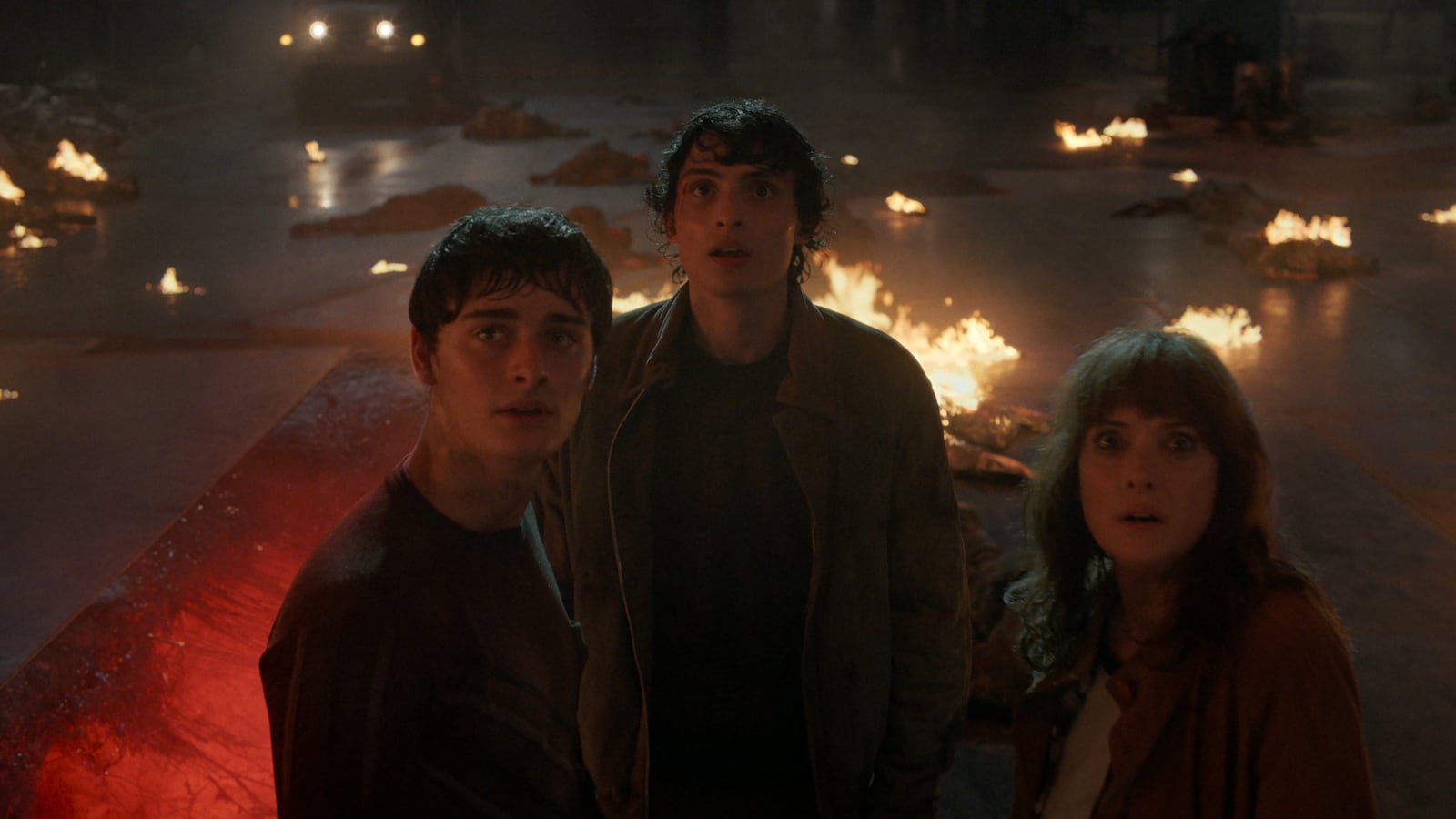 Noah Schnapp as Will Byers, Finn Wolfhard as Mike Wheeler, and Winona Ryder as Joyce Byers