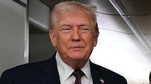 US President Donald Trump speaks to the press aboard Air Force One on January 11, 2026. Trump said Sunday his administration was working well with Venezuela's interim leader Delcy Rodriguez and that he would be open to meeting with her.