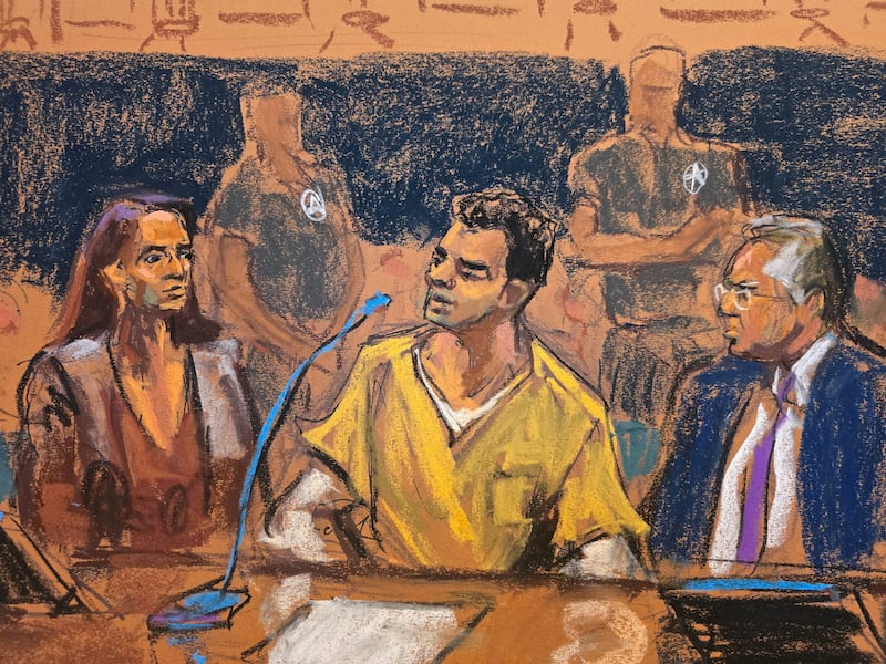 Luigi Mangione sits between defense lawyers Karen Friedman Agnifilo and Marc Agnifilo as he allocutes during a hearing in his federal murder trial at Manhattan Criminal Court in New York City, U.S., August 14, 2026 in this courtroom sketch. Luigi Mangione admitted in court on Friday to killing UnitedHealthcare CEO Brian Thompson and pleaded guilty to federal charges of stalking the executive with the intent to kill him. REUTERS/Jane Rosenberg
