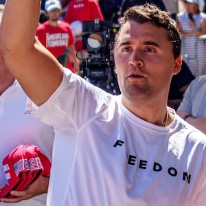 OREM, UTAH - SEPTEMBER 10: Charlie Kirk throws hats to the crowd after arriving at Utah Valley University on September 10, 2025 in Orem, Utah. Kirk, founder of Turning Point USA, was speaking at his "American Comeback Tour" when he was shot in the neck and killed. (Photo by Trent Nelson/The Salt Lake Tribune/Getty Images)