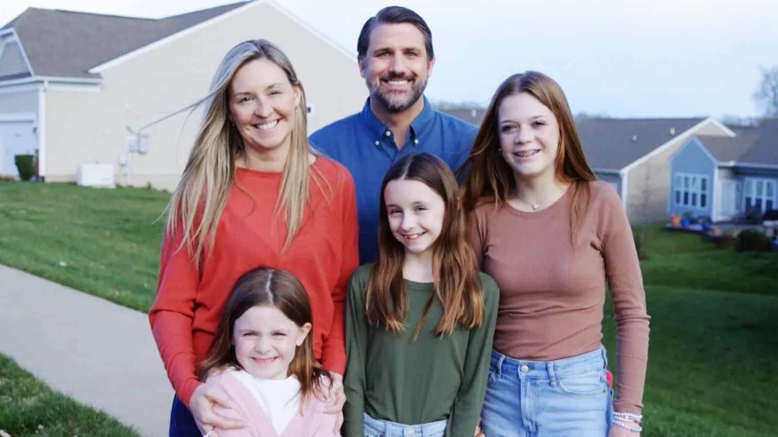 Derrick Anderson with a woman and kids who are not his own.