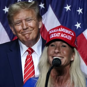 Marjorie Taylor Greene (R) speaks alongside Donald Trump at a campaign event in Rome, Georgia, on March 9, 2024.